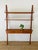 Vintage 1960s Danish Modern Teak Omnibus Wall Mounted Shelving Unit made of teak wood brass brackets 3 adjustable shelves...