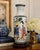 A striking vintage Chinese porcelain vase executed in the famille rose tradition, featuring beautifully hand-painted...