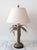 Brass palm tree table lamp with a beautiful patina. In working condition. *Does not include the lamp shade.