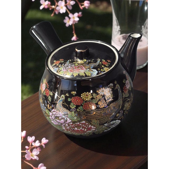 .This Vintage Asian Japanese Sake Pot is a beautifully decorated tea pot, showcasing traditional Japanese design elements...