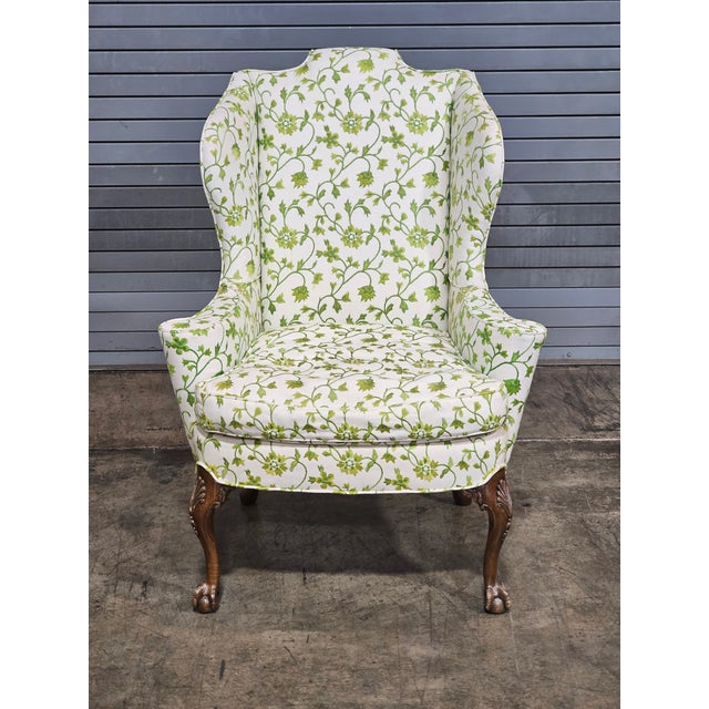 Store Item: Chippendale Mahogany Wing Chair Carved Ball & Claw Feet Needpoint Fabric Description: Chair feature a high...
