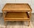 This beautifully crafted vintage bamboo, rattan, and wicker table features an elegant two-tier design with exceptional...