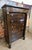 Empire period chest of drawers, early 19th century, in flame mahogany, with seven drawers in the front and detached column...