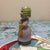 The piece exhibits the distinctive charm and soft pastel palette characteristic of European novelty porcelain wares,...