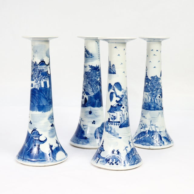 A fine set of 4 antique Chinese Export porcelain candlesticks. In the Canton pattern. Each in an inverted trumpet form and...