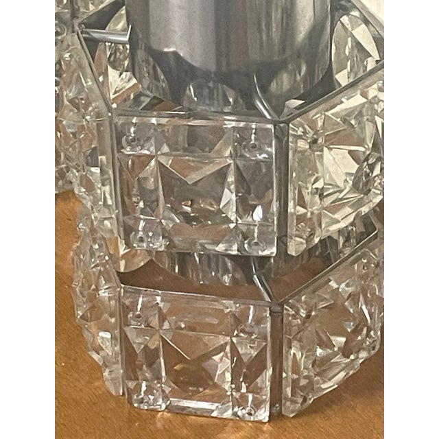 Set of 5 beautiful pendant lamps from the 1970s with Swarovski cut glass and chrome-plated metal parts. The light has a...