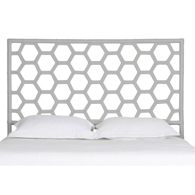 This headboard features classic Rattan design in a geometric pattern. Constructed of solid rattan and hand bound with...