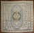 A Mid-20th Century Turkish Rug in predominantly white and blue. Measures: 13'' x 15'.