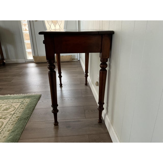 Very versatile console table in mahogany. Have used all thru the house for different purposes
