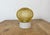Vintage industrial ceiling or wall light made in former Czechoslovakia during the 1970s. It features a white porcelain...