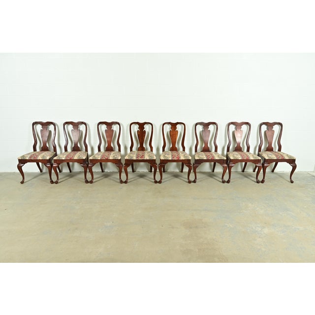 An outstanding set of eight Queen Anne or Georgian style dining chairs In the manner of Baker Furniture USA, Circa 1980s...