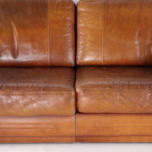 Stunning Roche Bobois leather living room set from the 1970s-1980s, comprising a sofa and two armchairs. This high-quality...