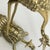 A pair of Japanese decorative brass crane sculptures, offering a striking interpretation of traditional symbolism in cast...