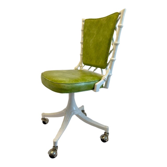 Mid Century vibes abound with this original vintage 1950s faux bamboo swivel chair designed by Phyllis Morris for Kessler...