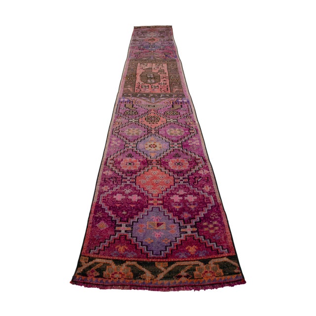 Hand-knotted by village artisans in the Kars region of Eastern Anatolia in 1954, this exceptionally long and narrow...