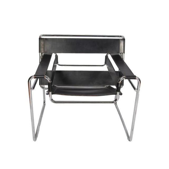 Beautiful Pair of the iconic Mid-Century Modern Wassily chairs with chrome frames and black leather. In great vintage...