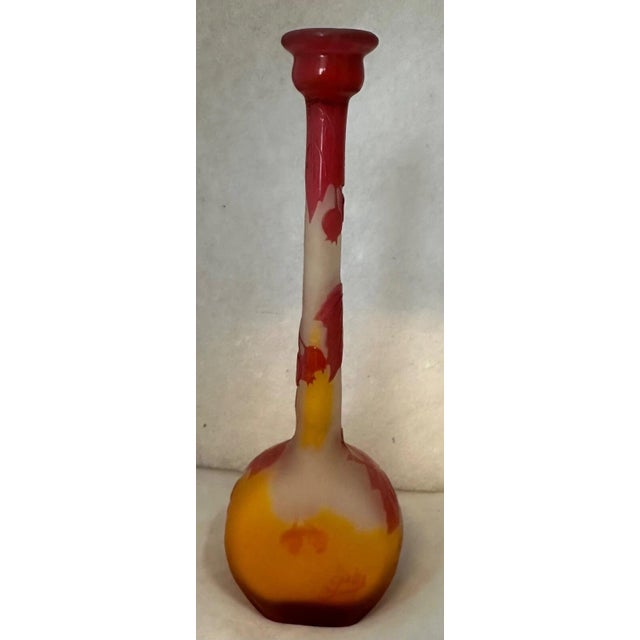 This vintage French cameo art glass vase is designed by Galle during the 1920’s. It features a frosted surface that was...