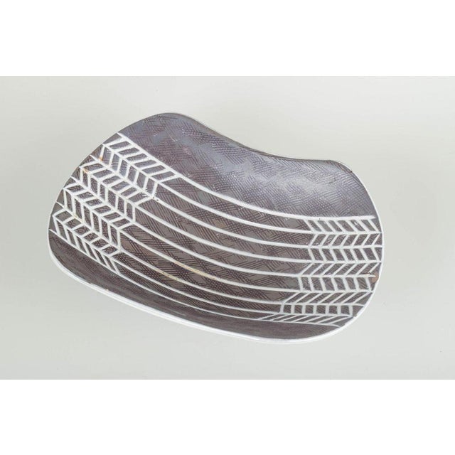 Mari simmulson for upsala-ekeby stoneware bowl from the 1960s, “ax” series. Organic form with concave sides and grey-blue...