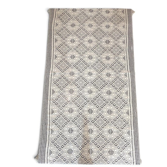 Exquisite vintage handmade crocheted tablecloth featuring an intricate geometric diamond lattice pattern accented with...