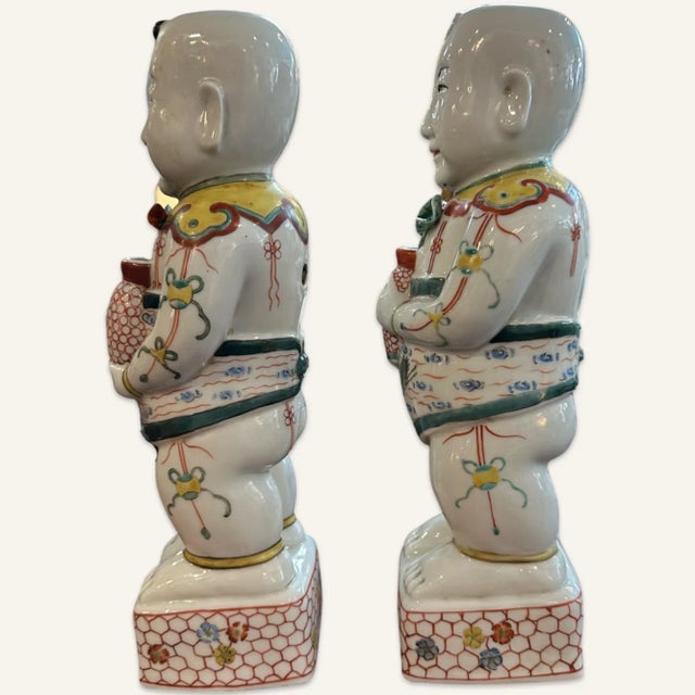 Late 19th Century Pair of Late 19th Century Famille Verte Reproduction Porcelain Boys Holding Lotus Flowers For Sale - Image 5 of 6