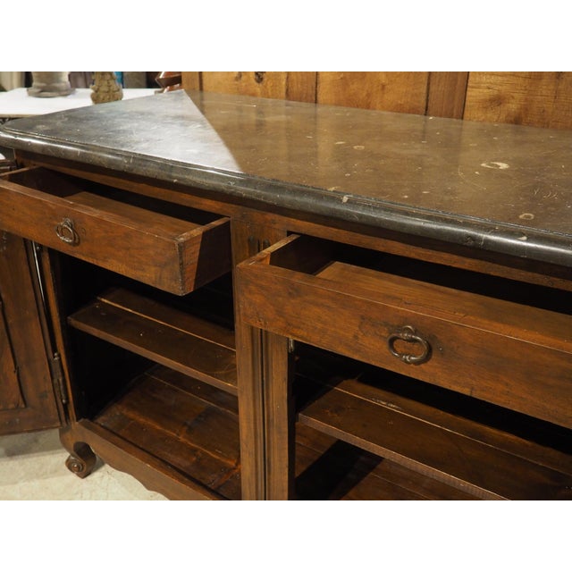 This beautiful walnut buffet de chasse (hunting buffet) is characteristic of furniture from the Rhone-Alpes region of...