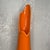 This Amazing Mid Century Modern Vase, in orange slag glass was designed by Le Smith in 1970. This piece has amazing colour...