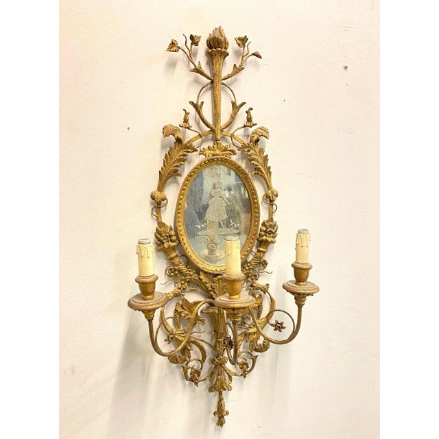 Wall sconce in antique style 50's, wood and gilded iron, oval mirror with engraved figure, 3 lights European Plug (up to...