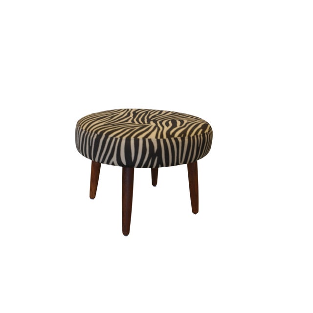 n round Danish stool that really becomes the little jewel of the room, a small pattern click that catches the eye and adds...