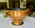French 1920s footed planter or champagne cooler features a hand-hammered copper body accented with stepped ridges and...