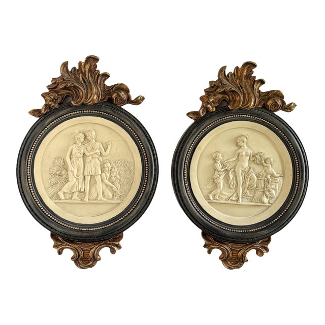 Mid 20th Century Pair of Neoclassical Figural Relief Wall Sculptures in Antiqued Gilt and Black Frames For Sale