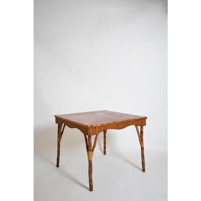 Rattan square game table, 1950s. Height: 75 cm - 29.53 in Length: 91 cm - 35.83 in Width: 91 cm - 35.83 in