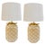 Pair of bohemian cream ceramic table lamps with a tufted textured finish and ribbon bows on top. With their boho elegant...
