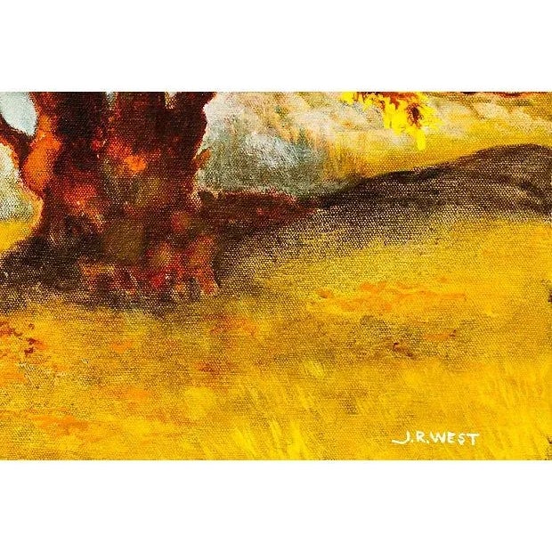 A substantial and period, oil landscape showing a dramatic view of a flame Maple tree standing beside a river and lit by a...