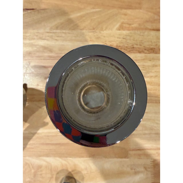 Beautiful and unique vintage shaker with a chrome mesh exterior and top. No chips, cracks or dents.