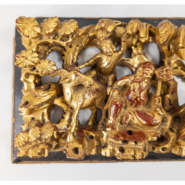 We are selling this Chinese carved and gilded wood panel with figures and animals. Crane or Heron is missing a head....