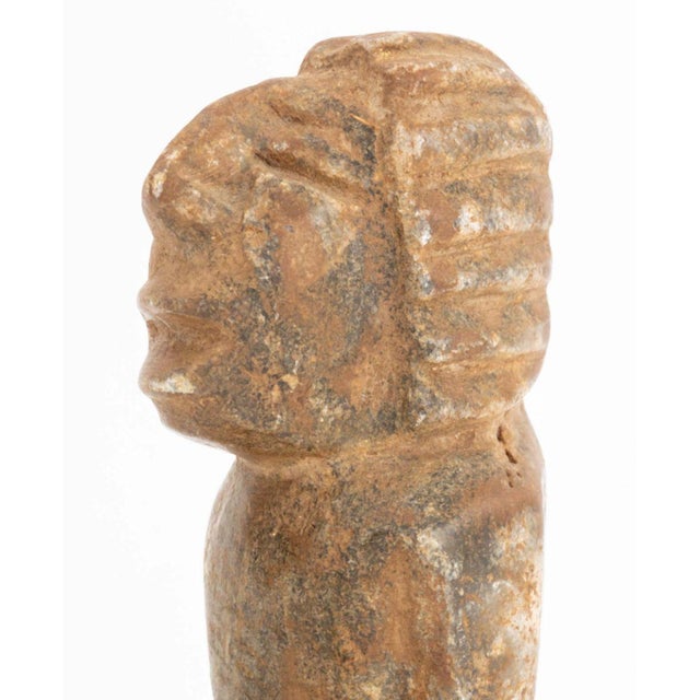 West African Nomoli Carved Stone Figure, probably Sierra Leone. 6.5" H x 2" W x 3" D. Provenance: From an East 74th Street...
