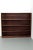 Bookcase for use in right corner. This rosewood veneer cabinet hasn’t got the right finish on its right side so it is most...