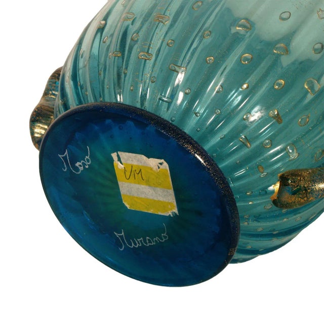 The vase is of important dimensions and optimally proportioned. It is signed Toso, Murano. This piece has an attribution...