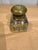 This is a stunning antique inkwell. It is French circa the 19th century. The body is glass, with a brass top. This inkwell...