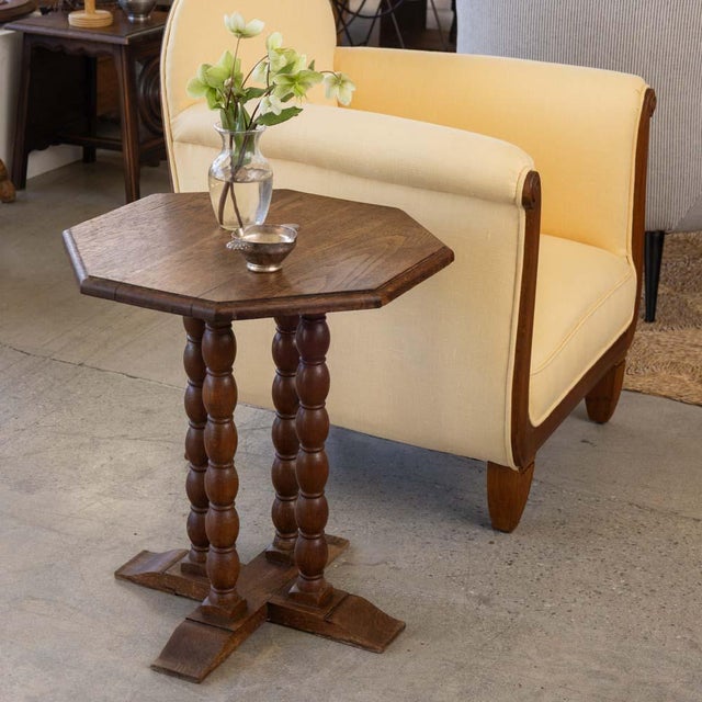 Beautiful bobbin wood side table from France, 1940s. Octagon top with four bobbin legs and pedestal base. Original finish...
