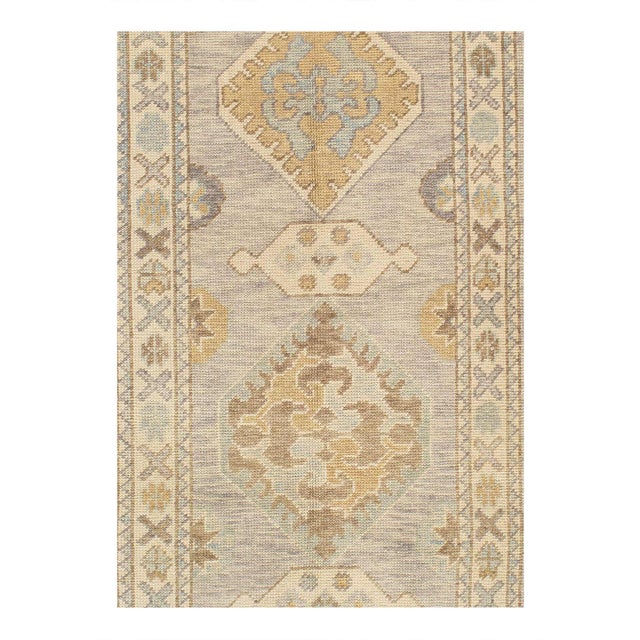 Hand knotted Turkish Oushak rug made of hand-spun lamb's wool rug and all natural dyes. This rug has a dense, soft pile,...