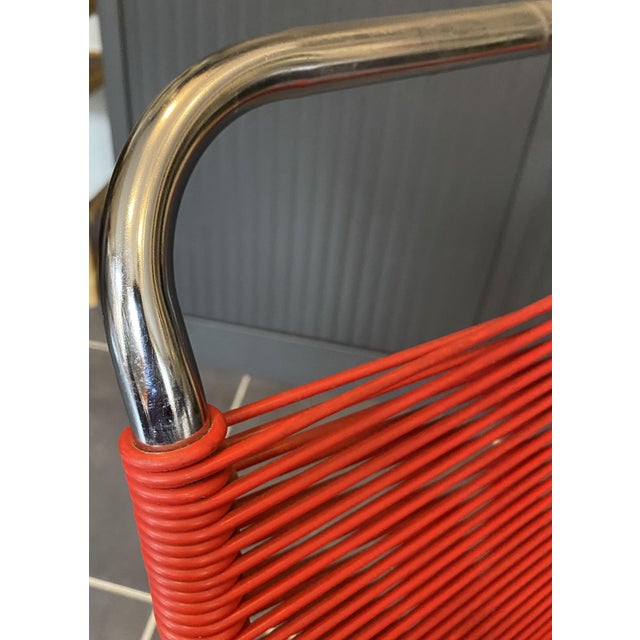Chair in very good overall condition, red thread Bright chrome, no pitting Very comfortable chair Height 79 cm Seat height...