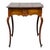 An elegant Louis XV carved table resting on long and graceful cabriole legs, the serpentine front fitted with a single...