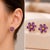 Six petal flower earrings studs with amethyst and citrines in 925 silver with gold plating over. Metal type: 925 silver...