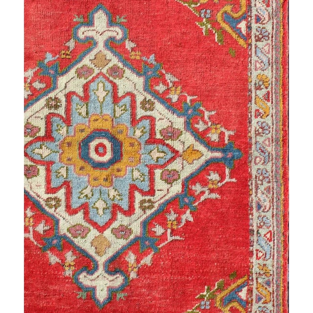 Antique Turkish Oushak small rug in bright red, blue, lavender, orange & green. Country of origin: Turkey; Type: Oushak;...
