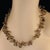 This is part of Chairish’s Costume Jewelry assortment. Stunning 19-Inch Smoky Quartz Nugget Necklace with Frosted Gold...