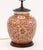 Chinese Iron Red Floral Decorated Porcelain Ginger Jar Mounted as a Lamp, with sphere form porcelain finial and mounted on...