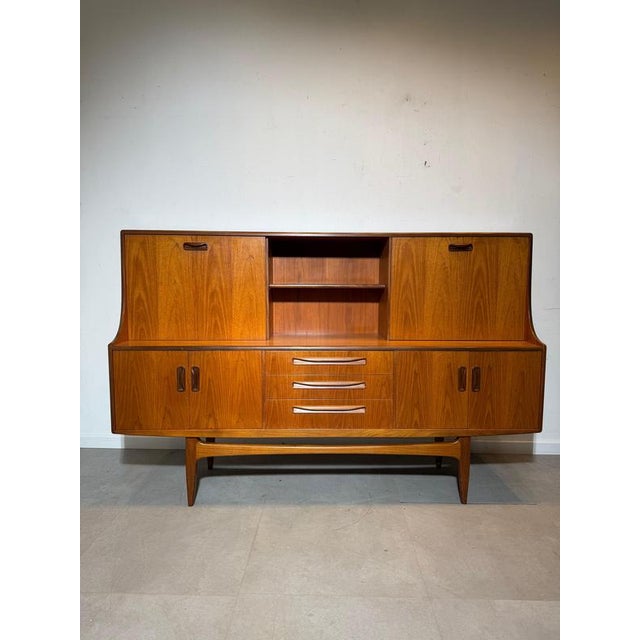 A stunning and highly functional G-Plan Fresco highboard, designed in the late 1960s and crafted in warm, beautifully...