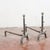 This pair of fireplace andirons makes for an interesting decorative element for the hearth, ideal for lovers of antiques...