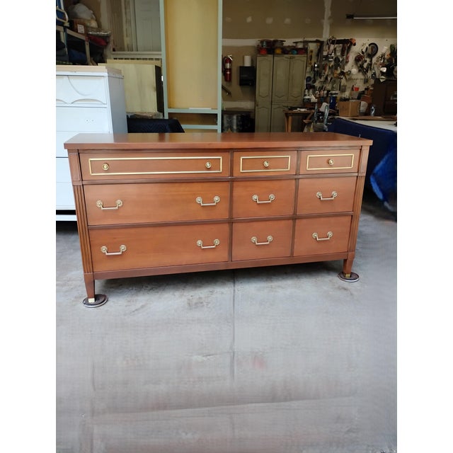 A beautiful traditional / mid century dresser inspired by Kindel Furniture. This dresser has been restored and refinished....